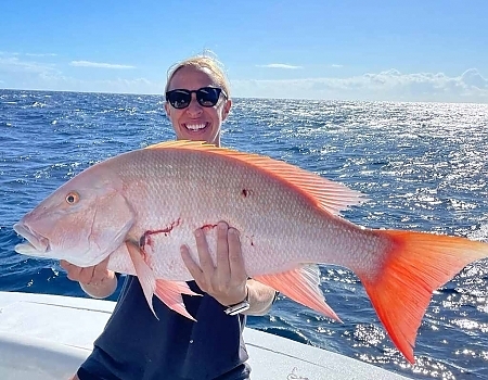  Posing with large fish